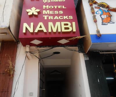 https://imgcld.yatra.com/ytimages/image/upload/t_hotel_yatra_city_desktop/v1423810606/Domestic Hotels/Hotels_Madurai/Hotel Nambi/DSCN4118_copy.jpg